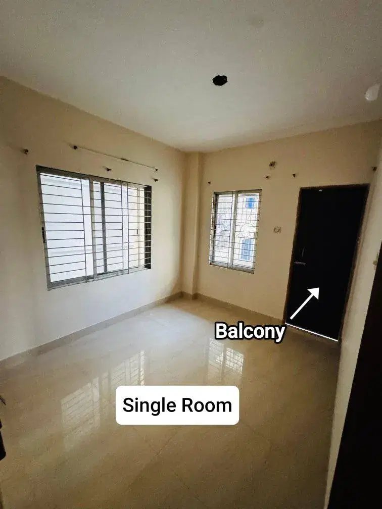 Single room with attached balcony