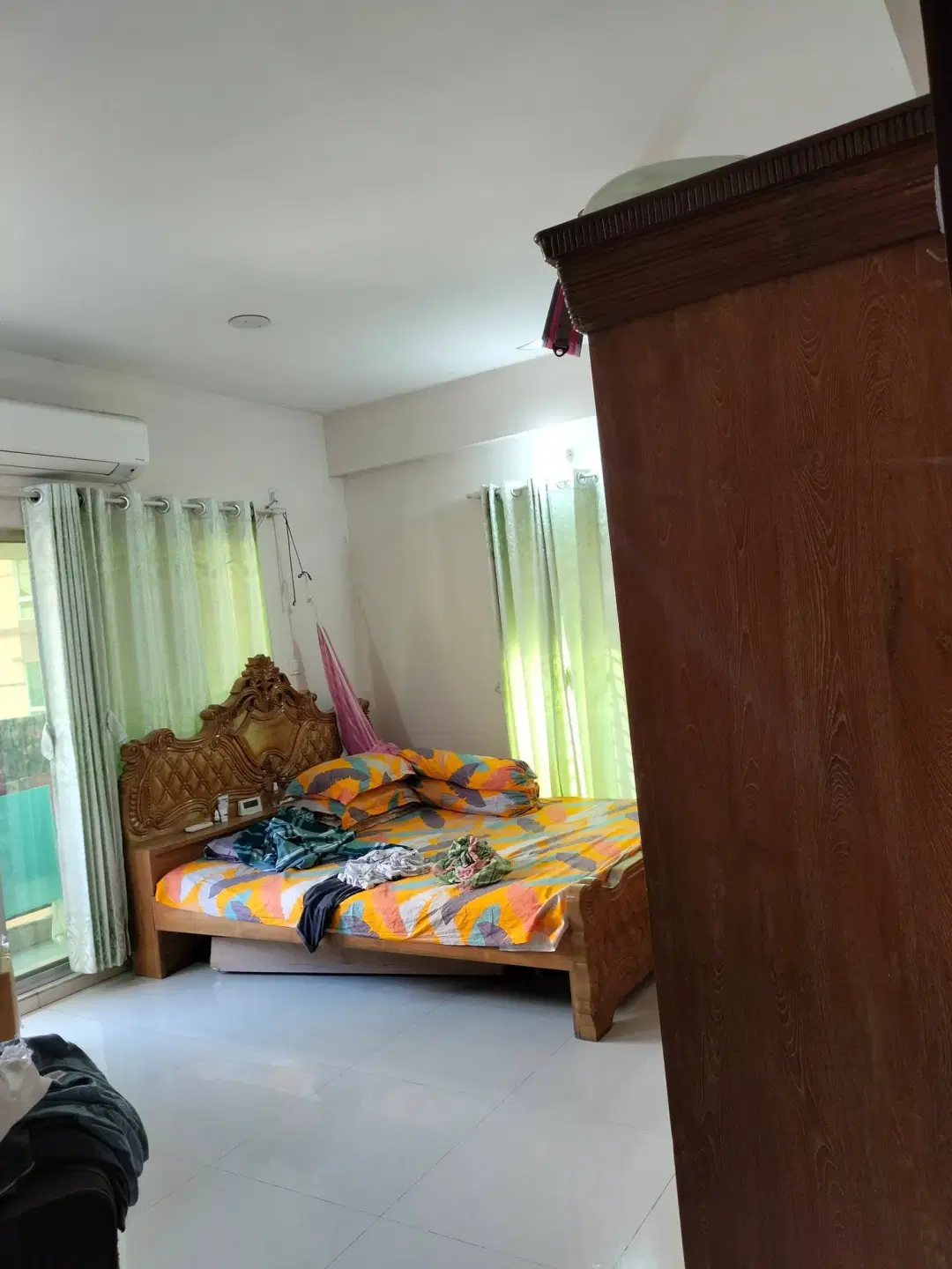 South-facing room with attached balcony